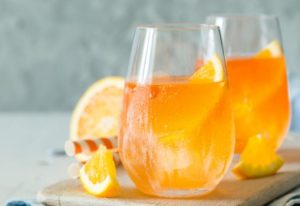 Two wellness drinks in glasses.