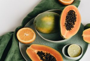 Fresh papayas on a plate.