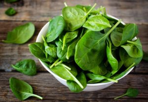 Fresh spinach in a bowl.