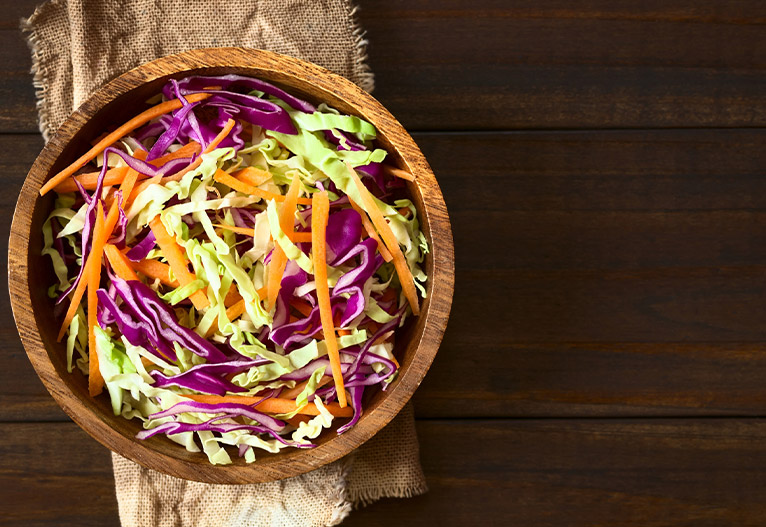 Bowl of rainbow coleslaw.