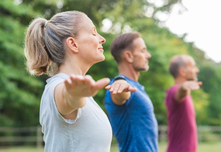People doing yoga.