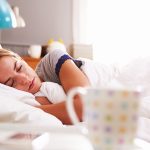 Woman asleep in bed.