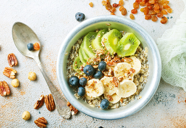 Bowl of oatmeal with fruit.