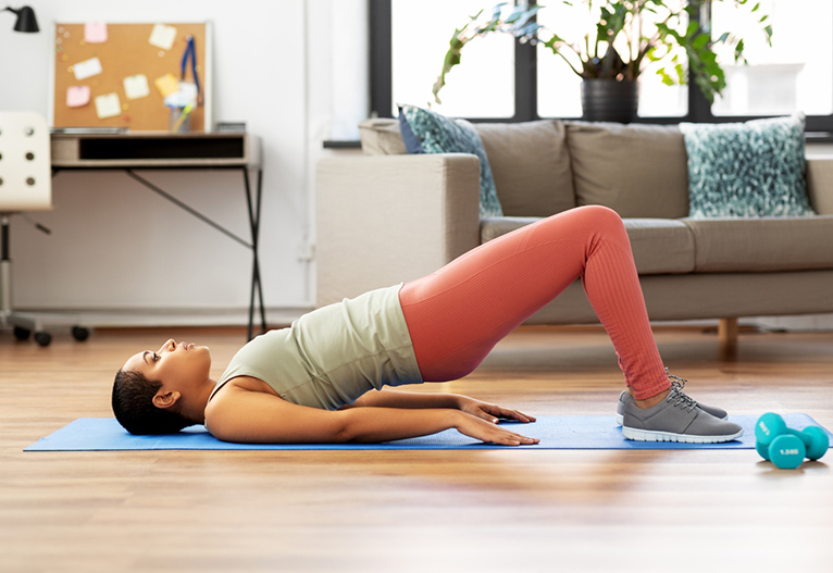 Woman doing pelvic floor exercise.