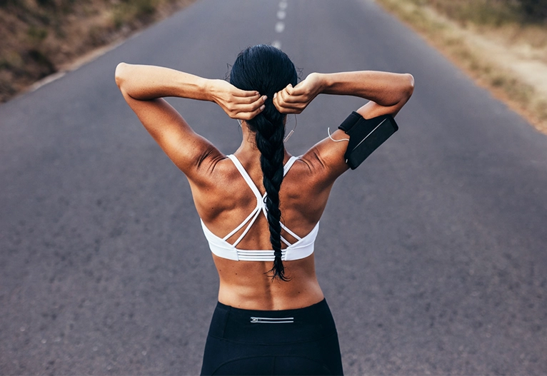 Woman preparing to run.