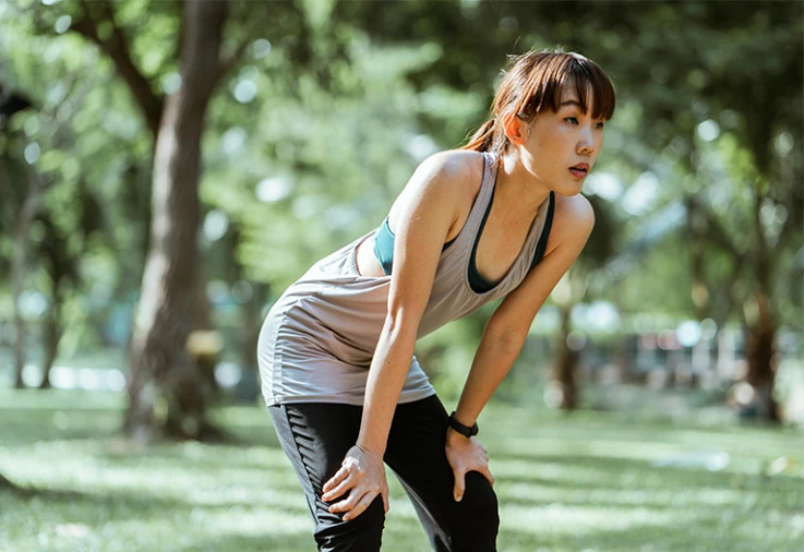 Tired jogger taking a break.